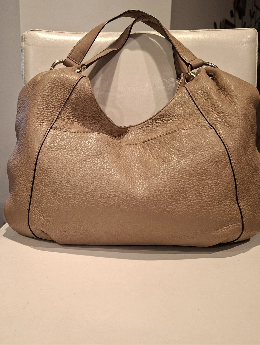 Michael Kors Beige Pebbled Leather Hobo with Tassel Charm
